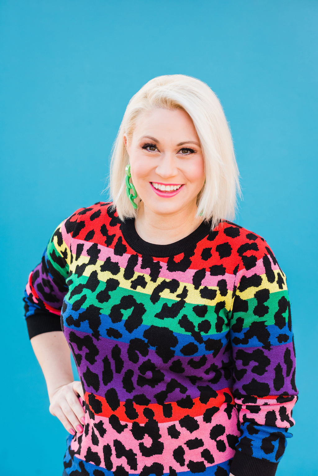 Portrait of Holly Gray in rainbow cheetah print sweater
