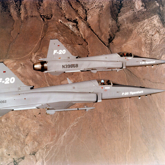 Two F-20 Tigersharks fly in formation