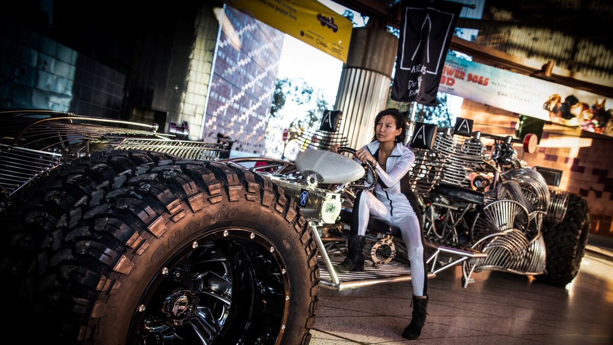 Area 15 galactic vehicle with female driver in Lorsch Family Pavilion