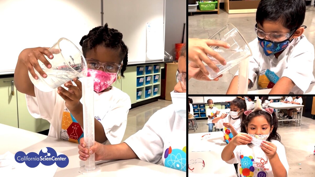 Camp youth participating in hands-on science activities