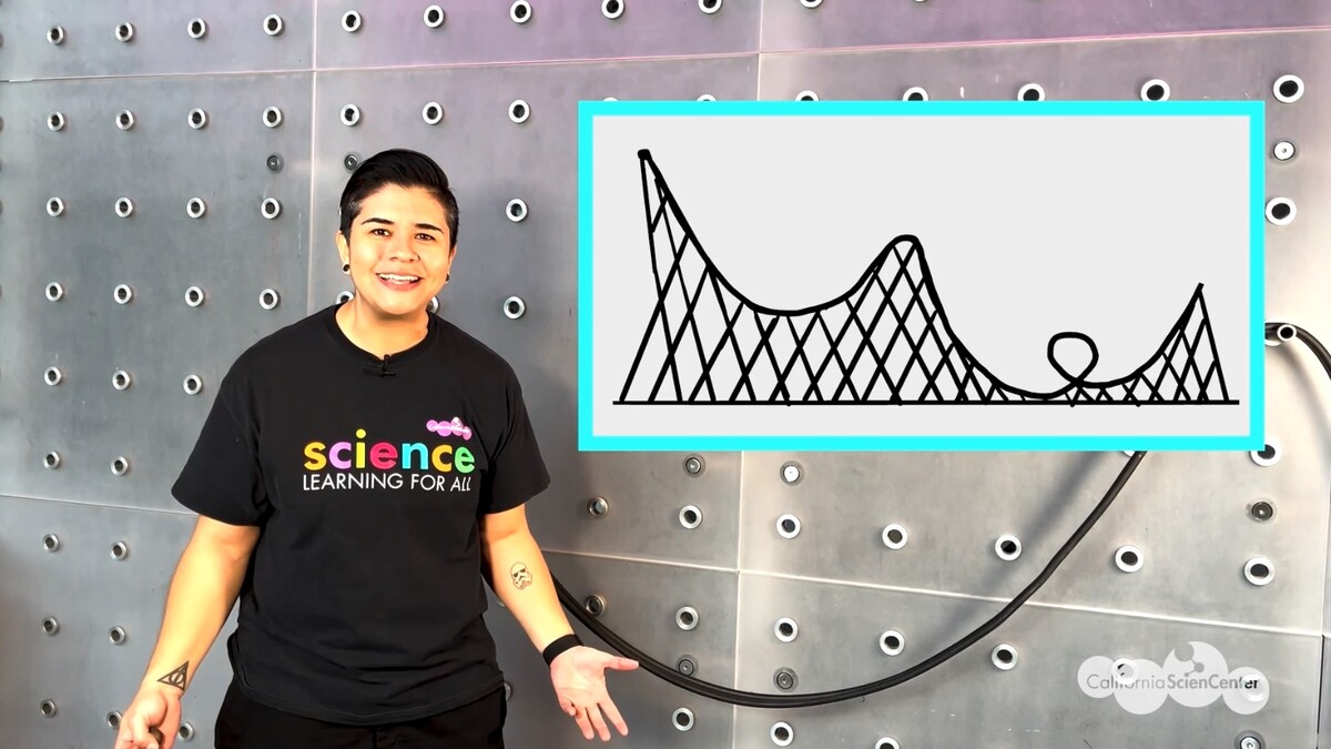 Educator demonstrating roller coaster experiment
