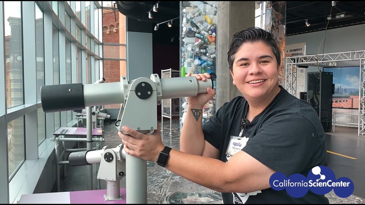 Educator Monica using telescope in LA Zone
